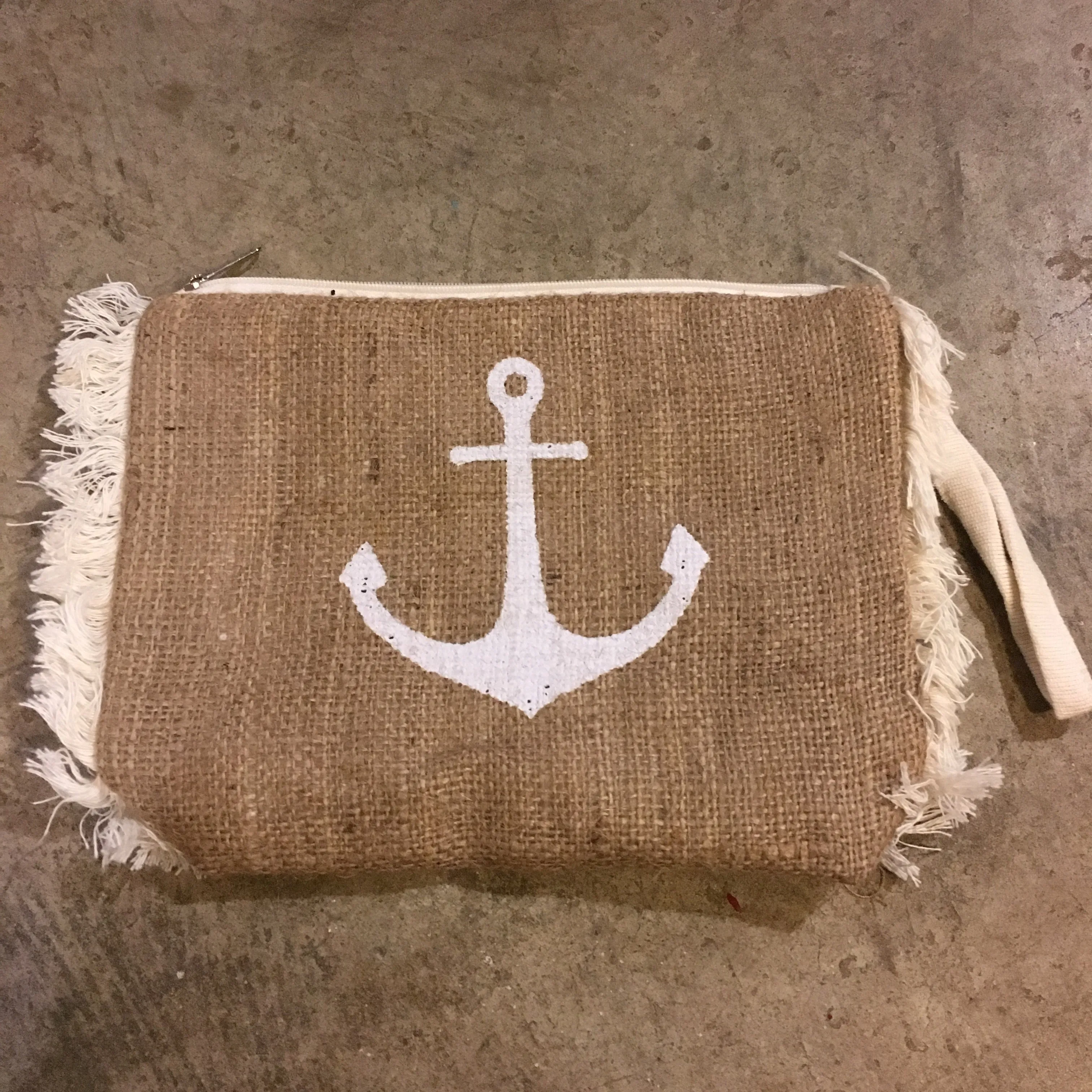 Pixie hessian tassel clutch
