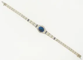 PLATINUM AND GOLD, BLACK OPAL AND DIAMOND BRACELET