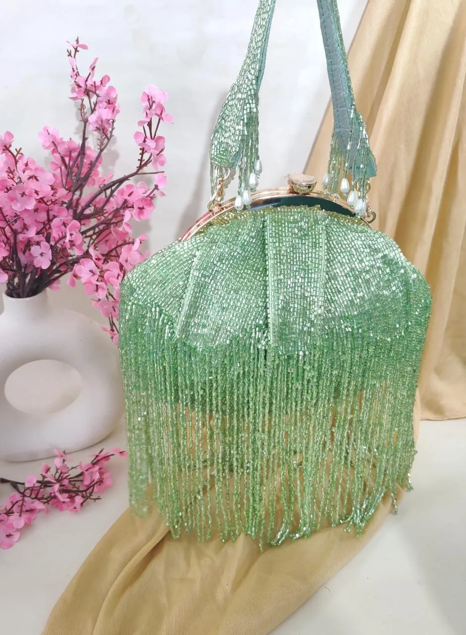 Rihana inspired tasssel clutches