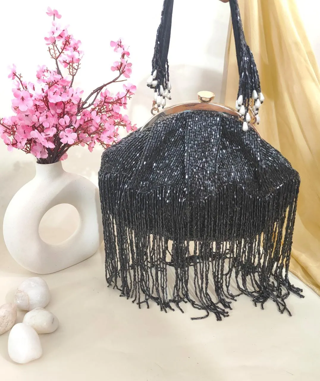 Rihana inspired tasssel clutches