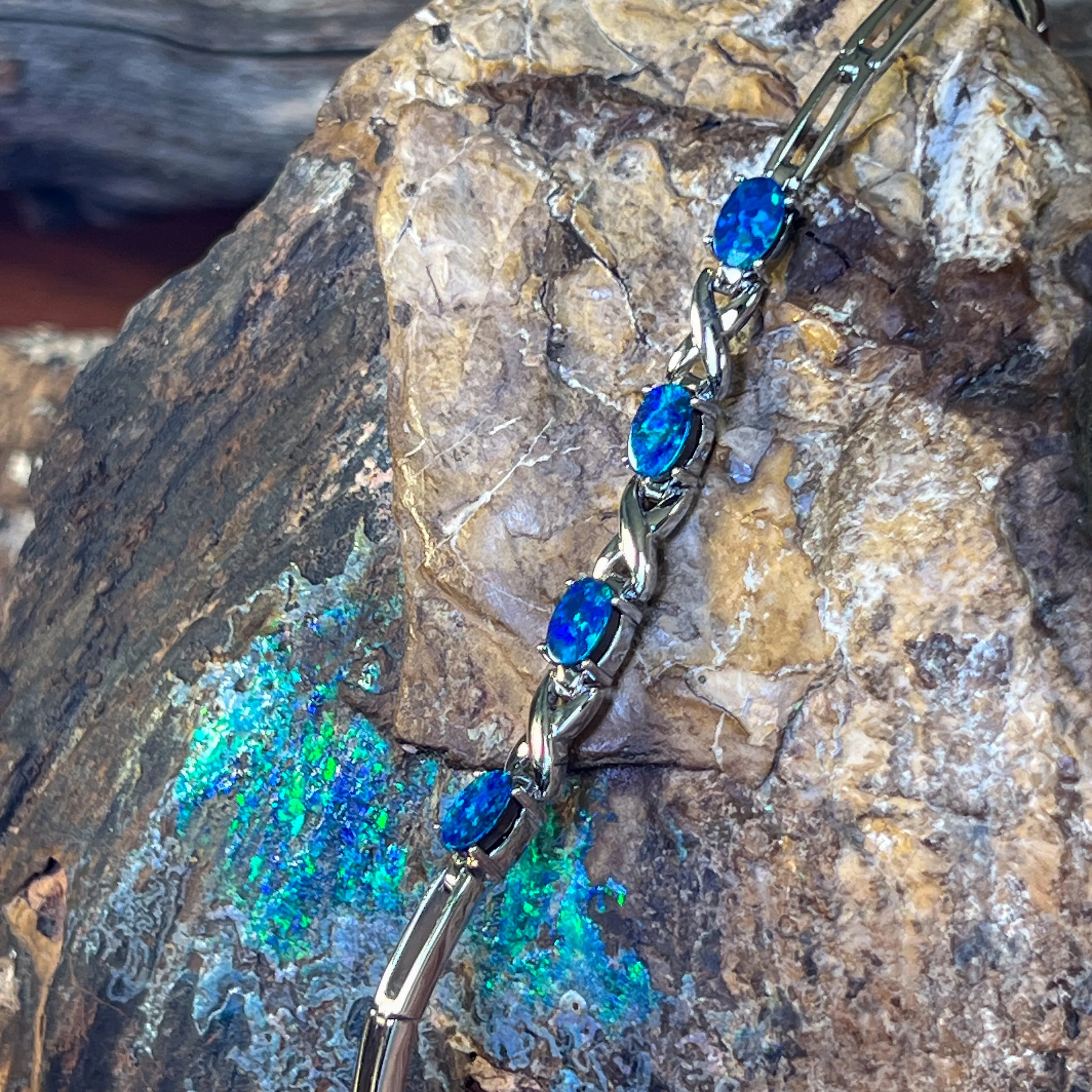 Sterling Silver Opal doublet 6x4mm bracelet claw set