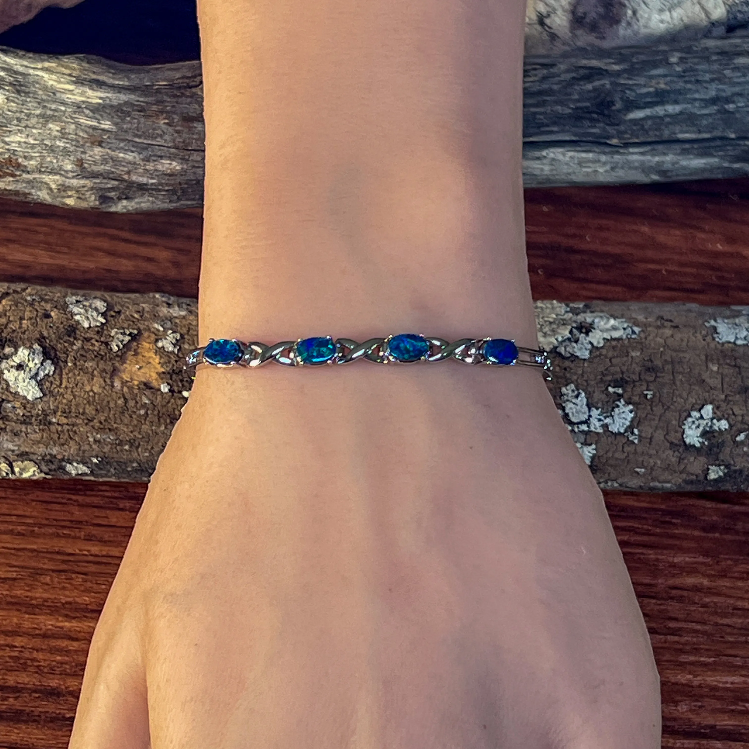 Sterling Silver Opal doublet 6x4mm bracelet claw set