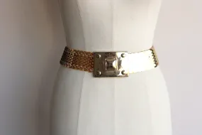 Vintage 1970s Gold Elastic Snake Belt By Harwill
