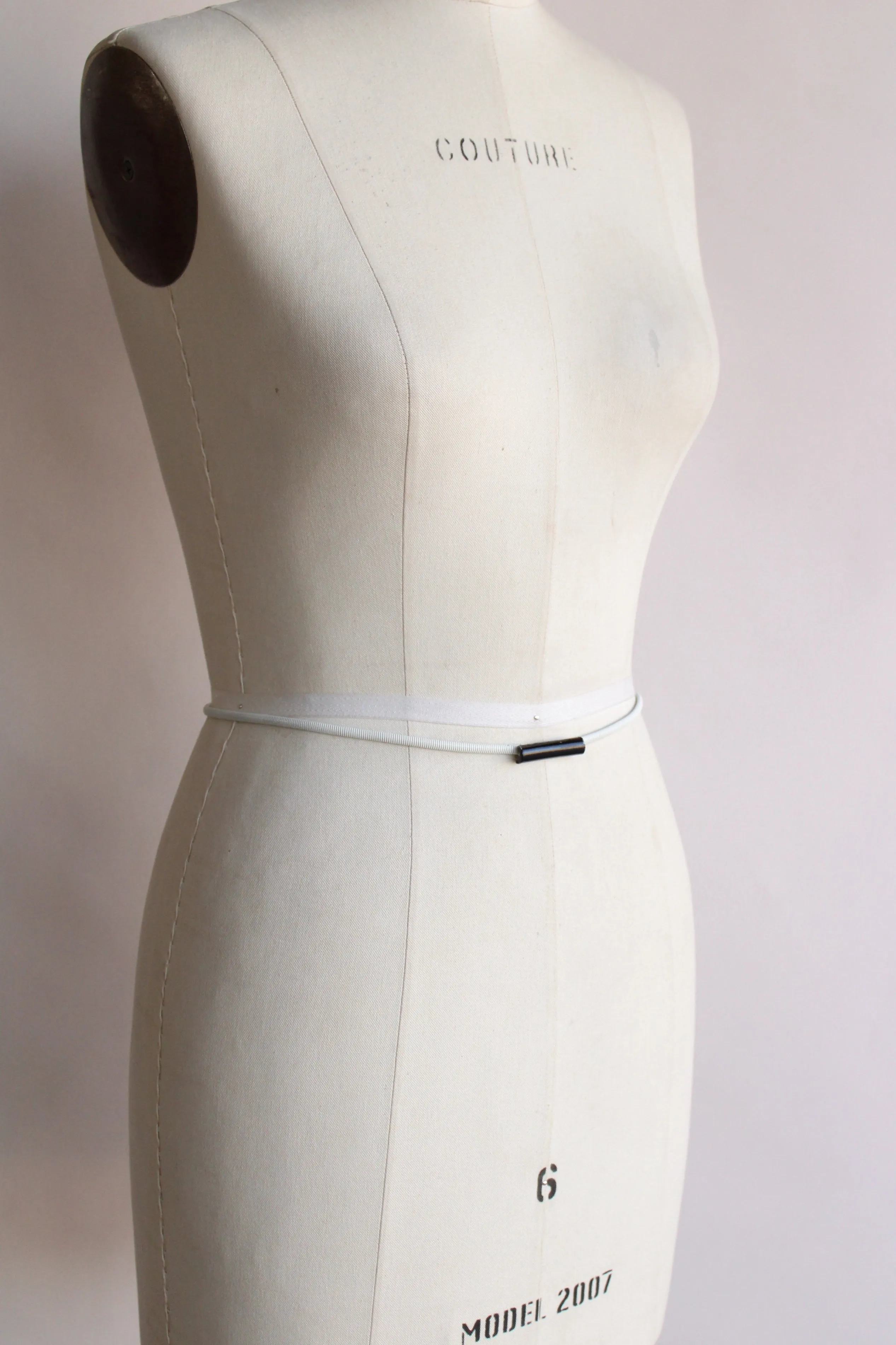 Vintage 1970s White Metal Skinny Belt